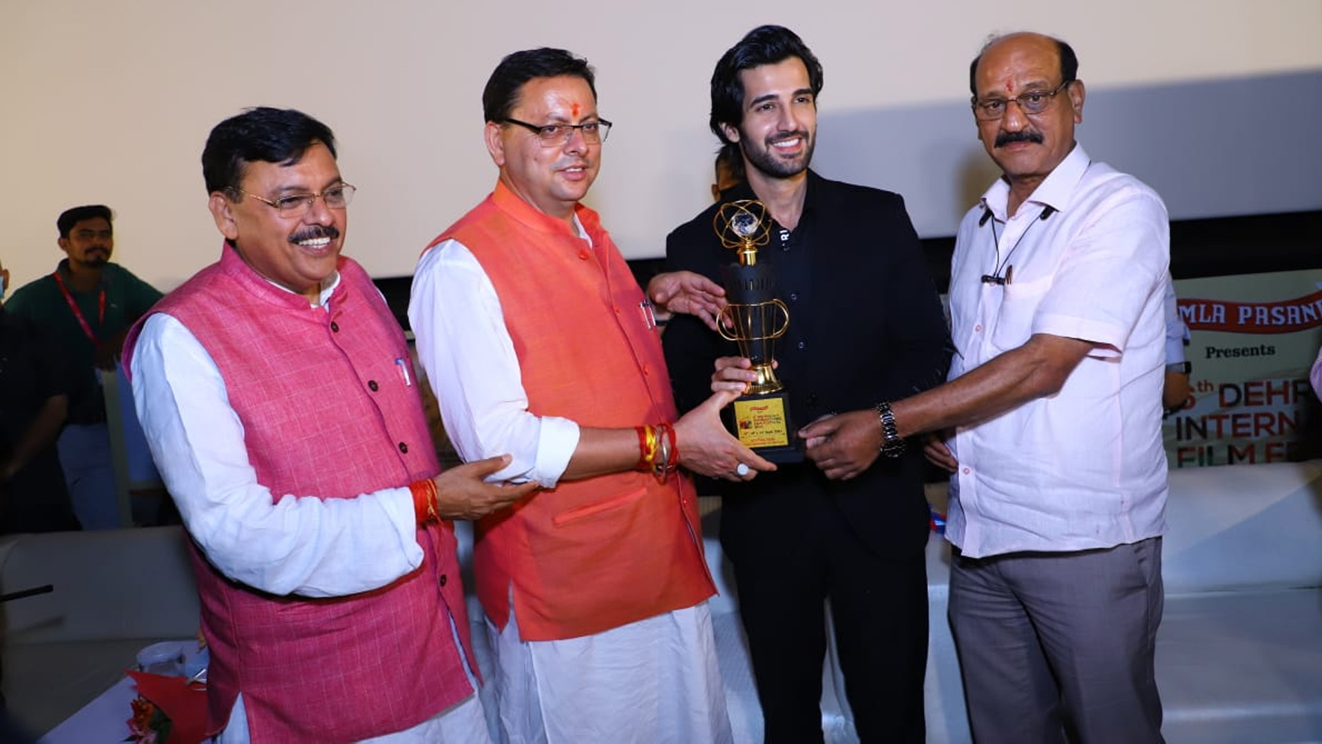 Aditya Seal receives the “Most Promising Actor” award by the Chief Minister of Uttarakhand at the prestigious 6th Dehradun International Film Festival