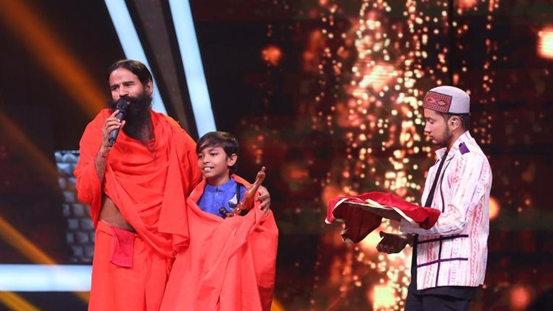 Baba Ram Dev gifts Superstar Singer 2 contestant Pranjal Biswas his vastra and kadhau from Haridwar