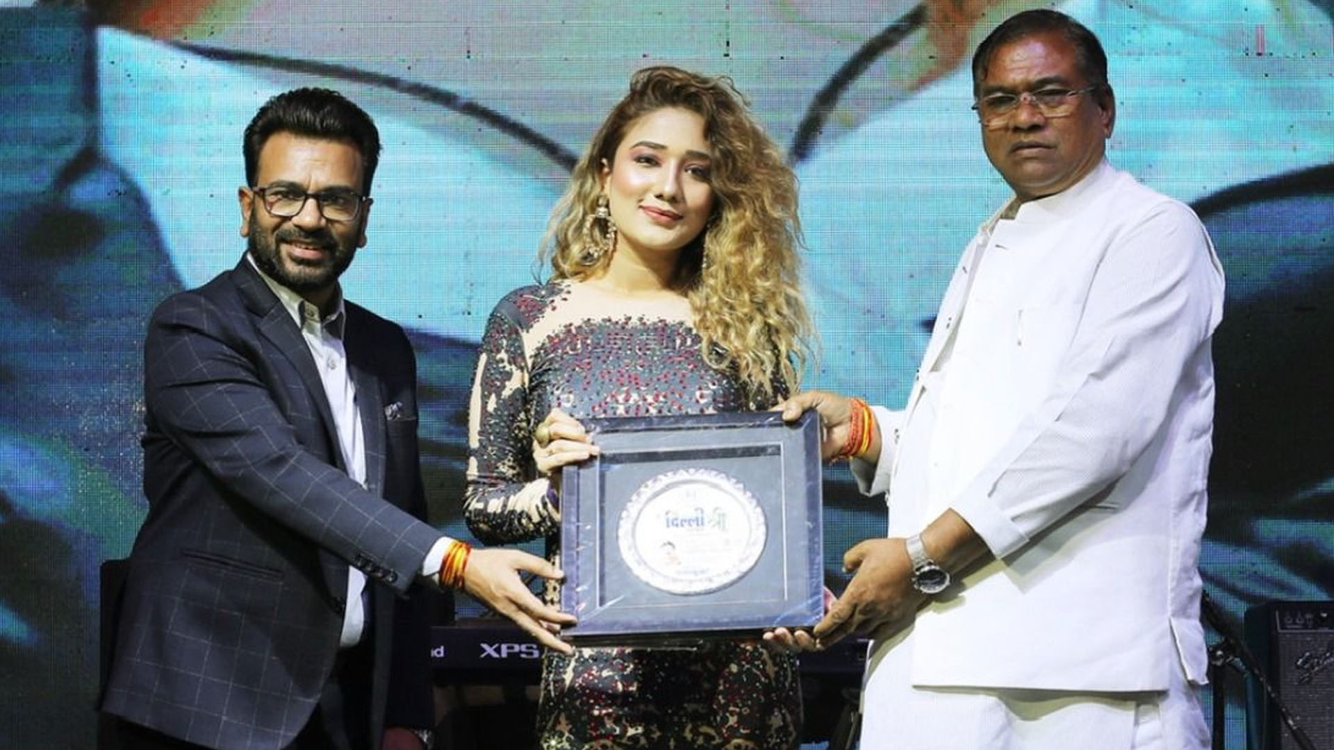 Singer Megha Kishore receives an award; dedicates it to her parents